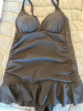 Black Ruffled Swimdress by Gottex size 40D.